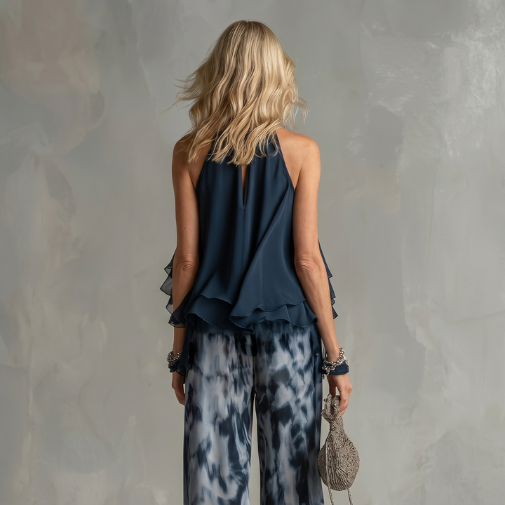 Ludovica - un elegante conjunto de chiffon que presenta una blusa de cuello alto y pantalones anchos estampados